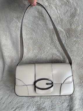 GUESS Cream baguette Shoulder Bag with Oval Hardware Accent